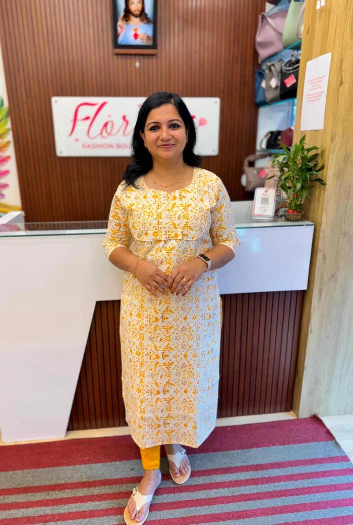 Casual wear Kurti in Cotton - Off-white with orange mix yellow print
